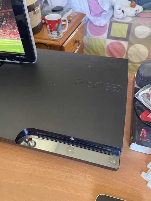 Consola ps3 com 4 jogos
