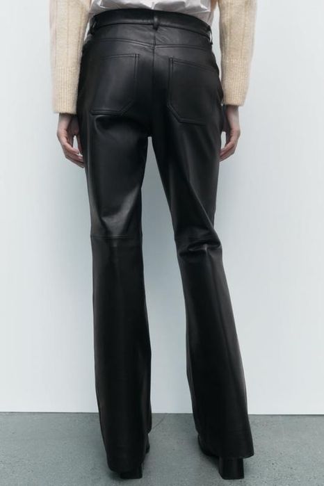 Шкіряні штаны чорного кольору з кишенями