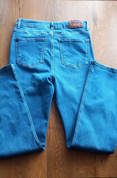 Spodnie jeansowe dzwony damskie 40 niebieskie