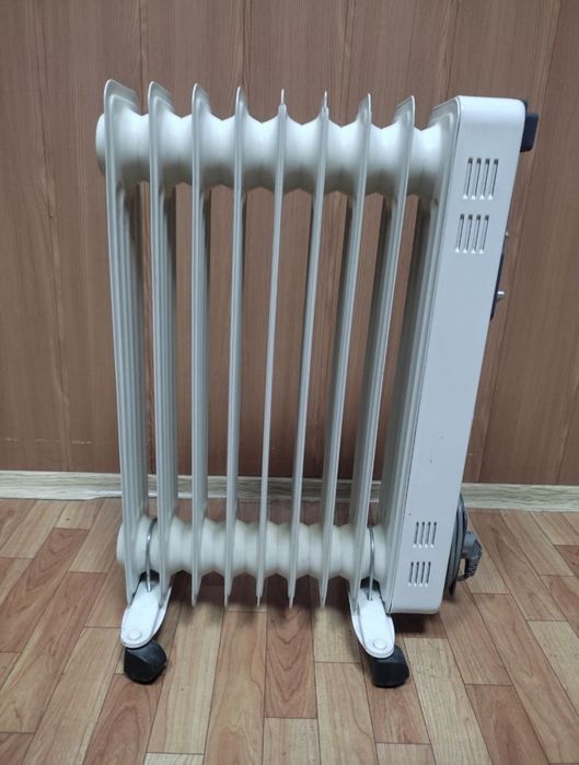 Масляний обогреватель