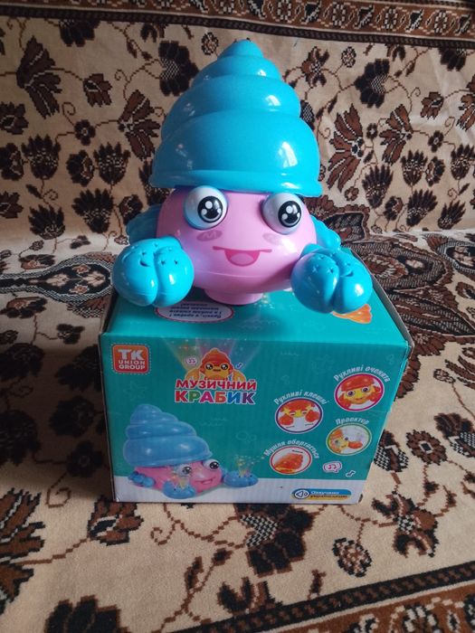 Детская музыкальная игрушка Крабик