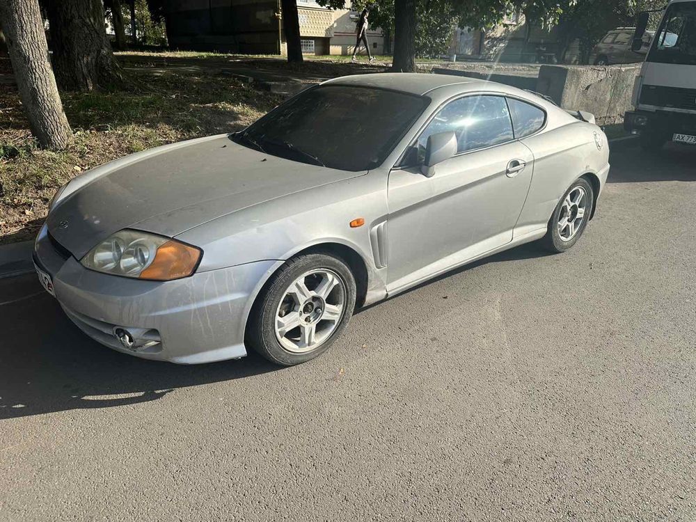 стекло Хюндай купе Hyundai coupe 05год