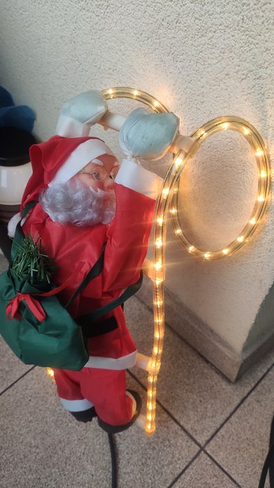 Mikołaj ozdoba świąteczna na świecącej drabinie led