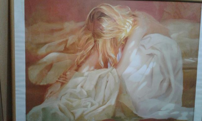 Obraz kobiety zamyslonej w łóżku, piękne zywe kolory