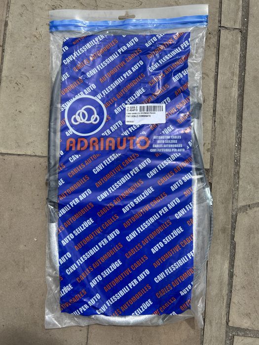 Трос ручного гальма правий Фіат Добло