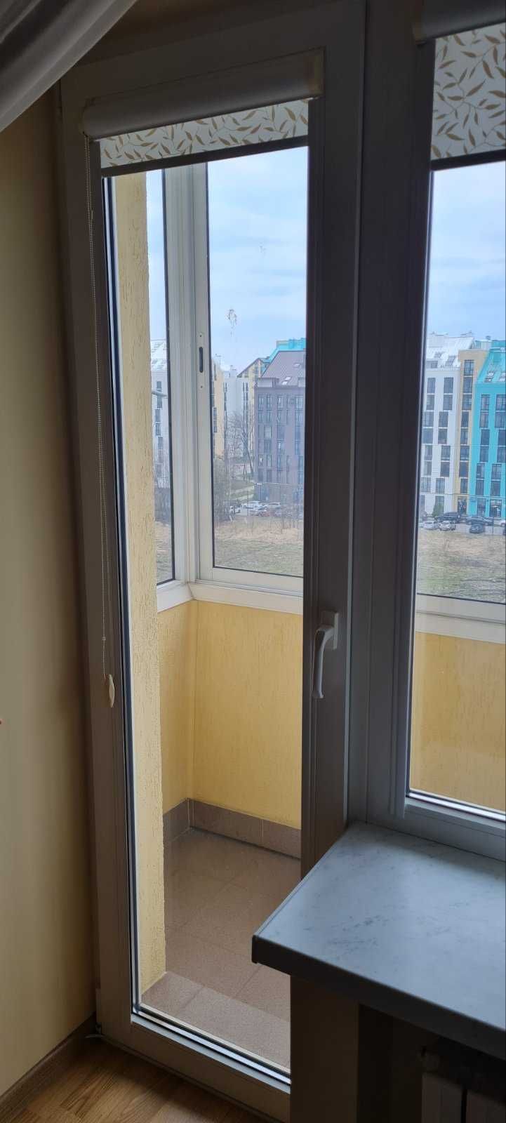 металопластиві вікно та двері REHAU бв