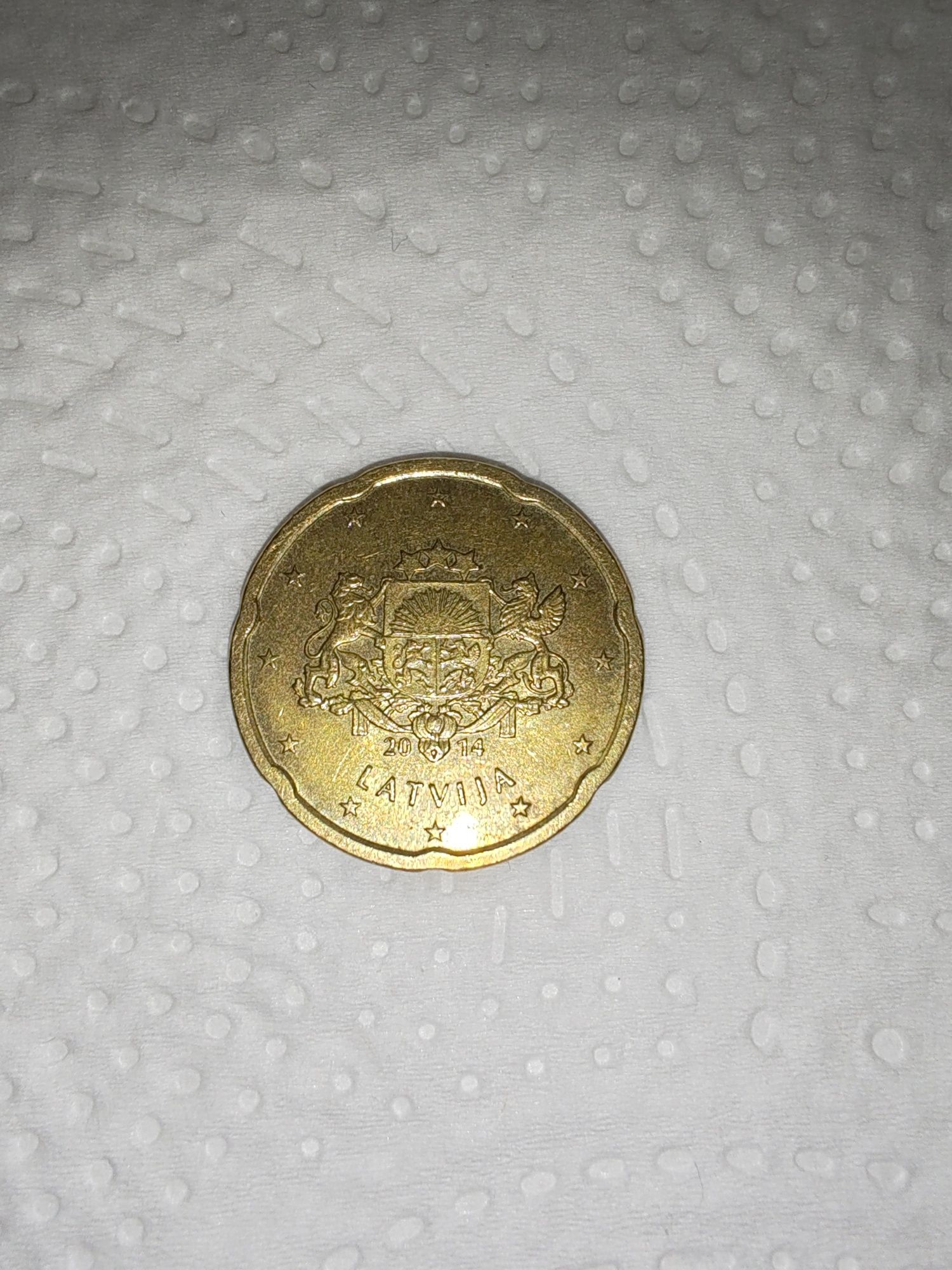 moeda de 20 cêntimos de euro da Letónia, cunhada em 2014.