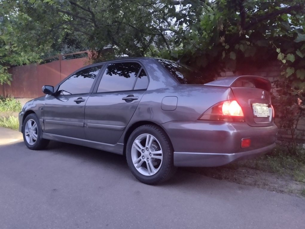Митсубиси Лансер 9 2л .