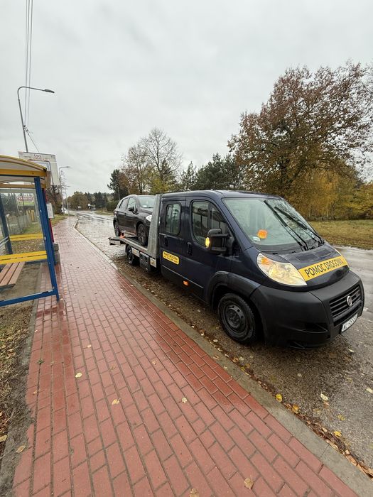 Auto laweta holowanie 24/7 transport aut osobowych busow maszyn