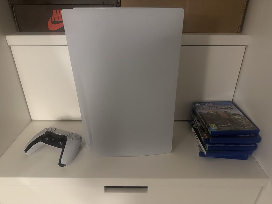 Ps5 com comando e jogos