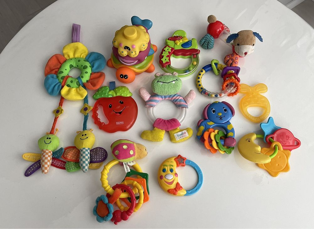 Розвиваючі іграшки для немовлят ( брязкальця, гризунці і тд )