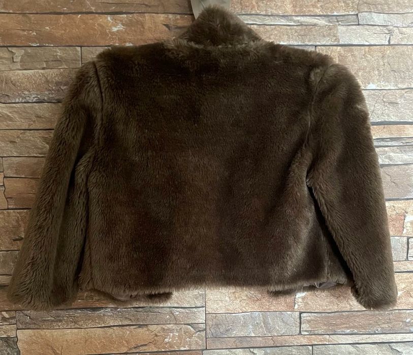Casaco de pêlo castanho