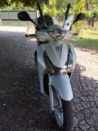 Honda sh 125i , troco por sh 300