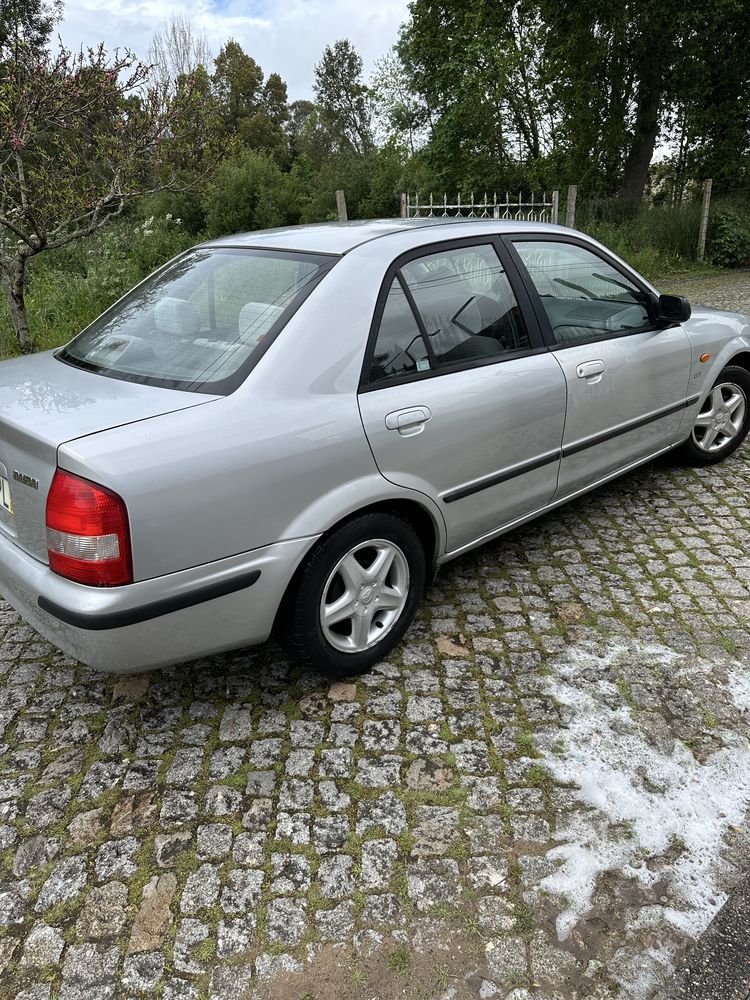 Mazda 323 125mil km
