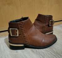 Botas castanhas pele