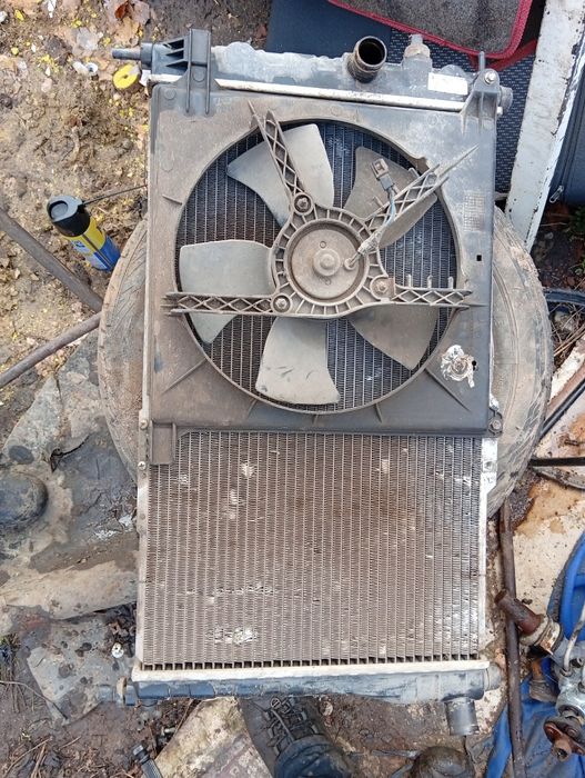 Радиатор с вентилятором опель,нексия.