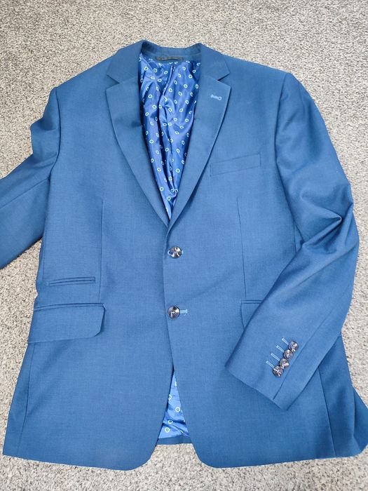 Garnitur młodzieżowy 60 % wełna granatowy męski XL/ L na 180 cm