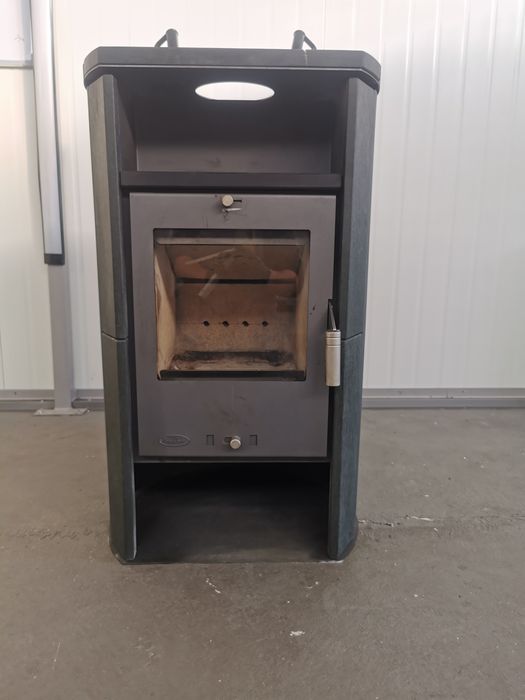 Kominek piecyk koza piec śliczny z kamieniami dom garaż hala magazyn