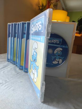 8 DVD dos Smurfs + Guru o mal disposto