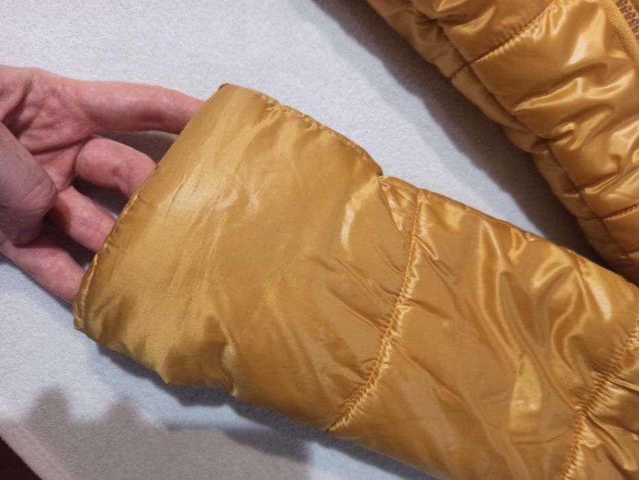 Zimowa kurtka dla dziewczynki coccodrillo 116 złota