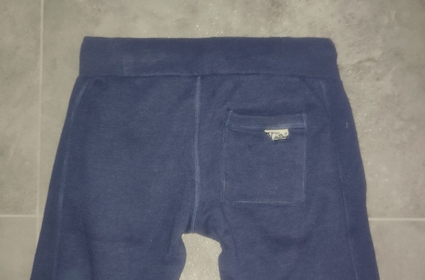 Spodnie Superdry dresy r. S granatowe