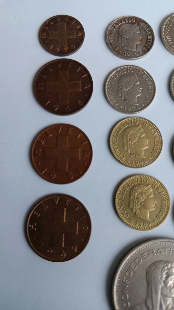 21 moedas de francos Suíços