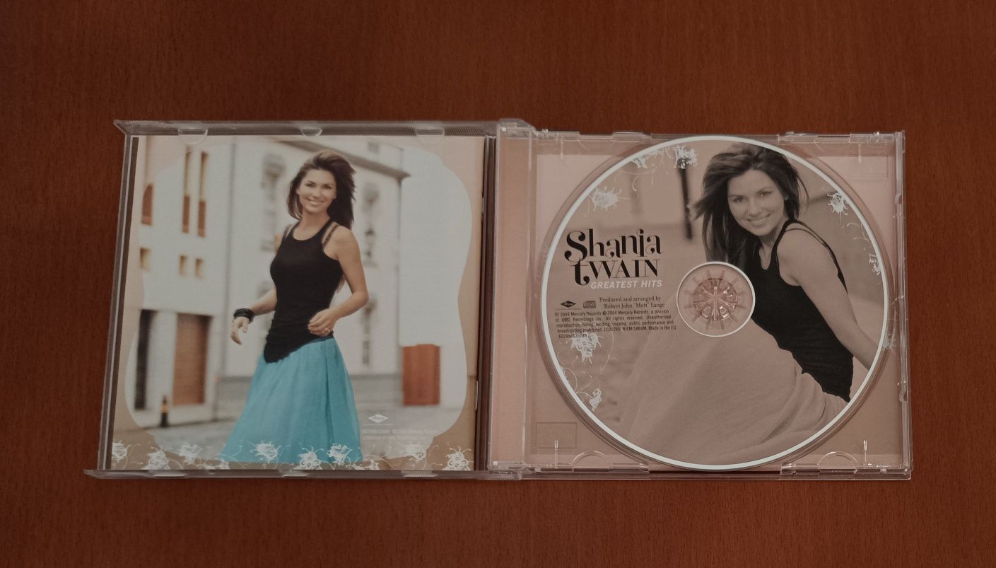 3 CDs de Shania Twain, Sheryl Crow e Abba.