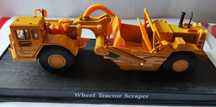 Model Zgarniarka kołowa Wheel Tractor Scraper w 1/64 AmerCom. Gazetka