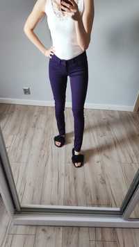 Tally Weijl spodnie biodrówki Xs fioletowe spodnie
