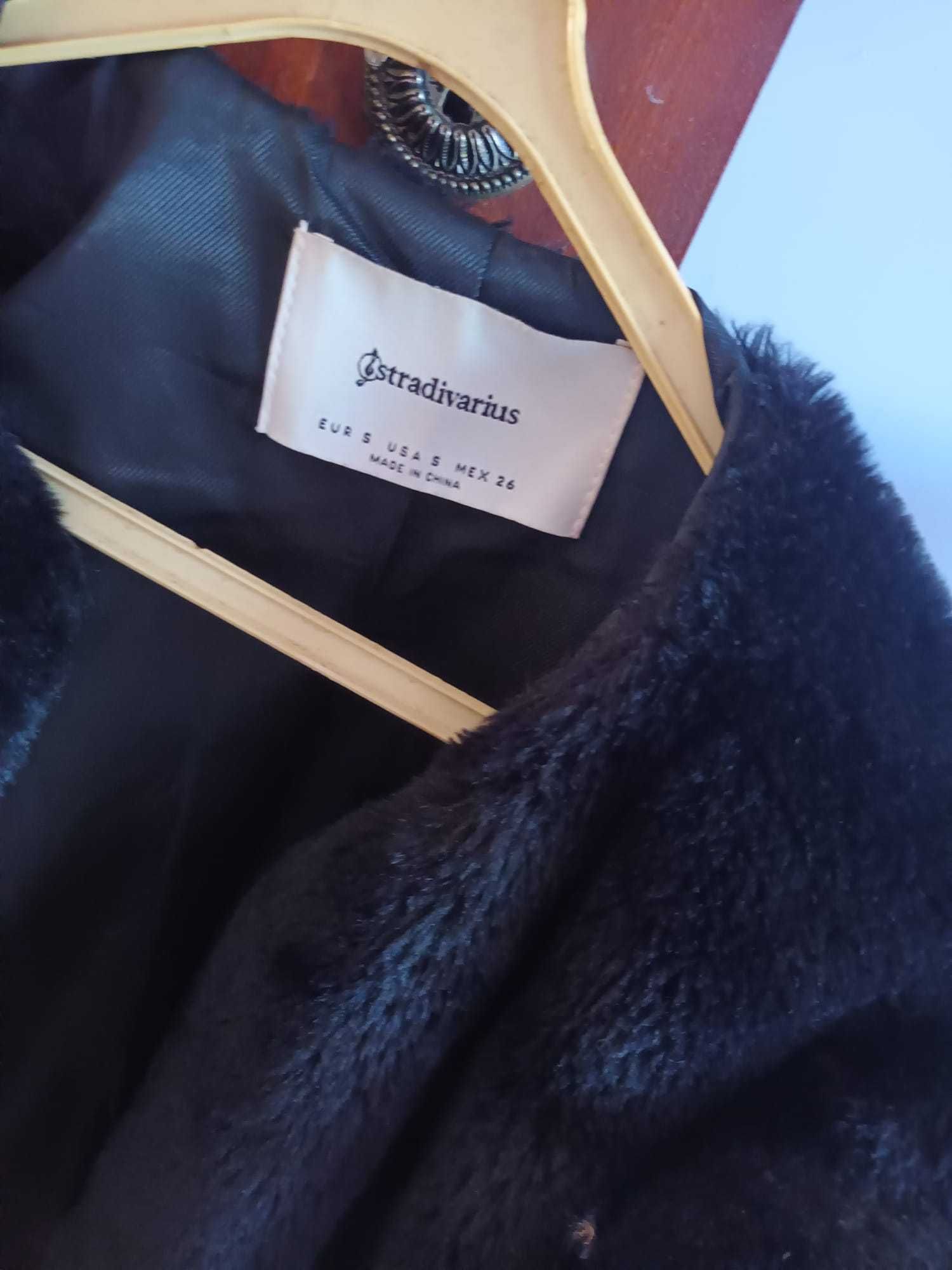 Casaco de pelo preto
