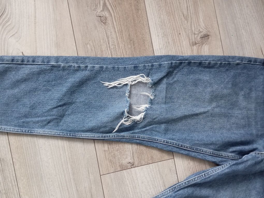 Spodnie jeansowe z rozdarciem Zara r. 42