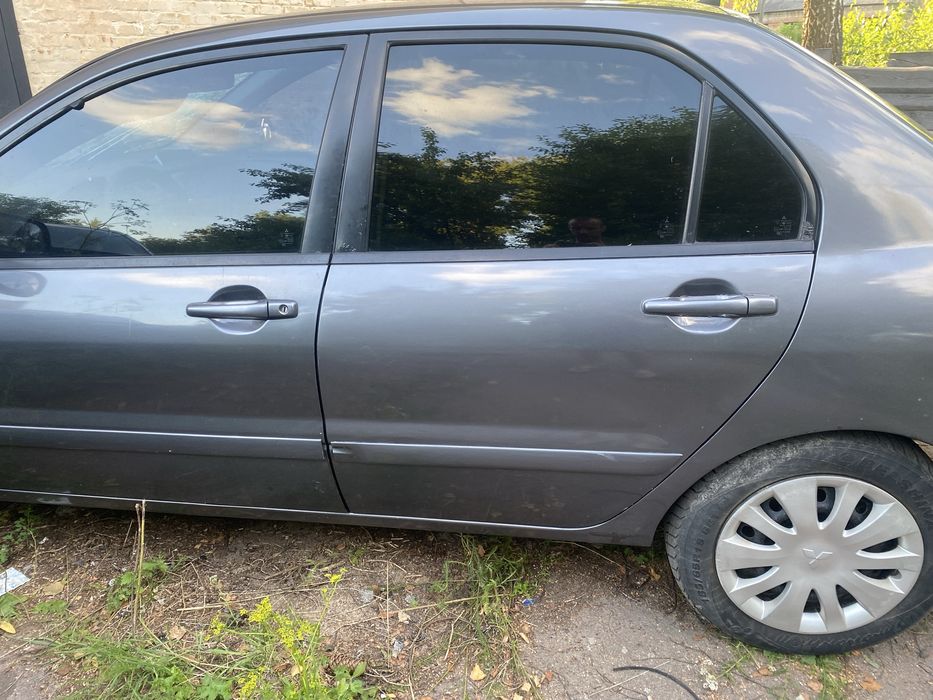 Двері двери міцубісі мицубиси лансер 9 mitsubishi lancer 9