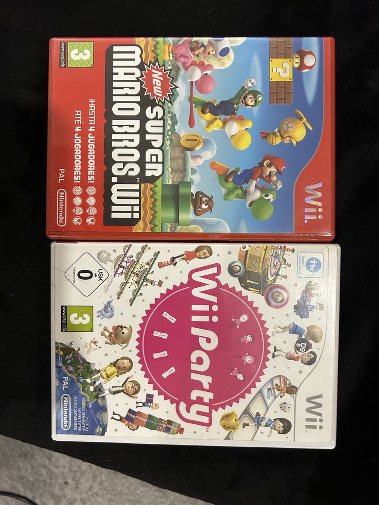 Wii com 1 comando 2 nunchuk e 3 jogos