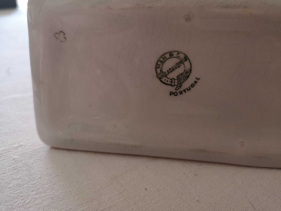 paliteiro antigo em forma de esfinge