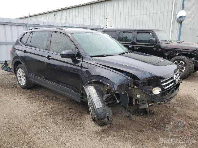 Разборка Volkswagen Tiguan  дверь зеркало четверть бампер фонарь