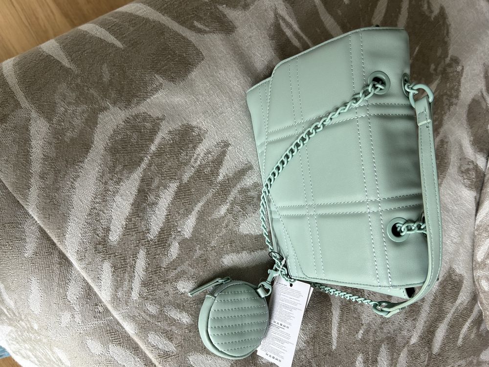 Bolsa tiracolo com moedeiro