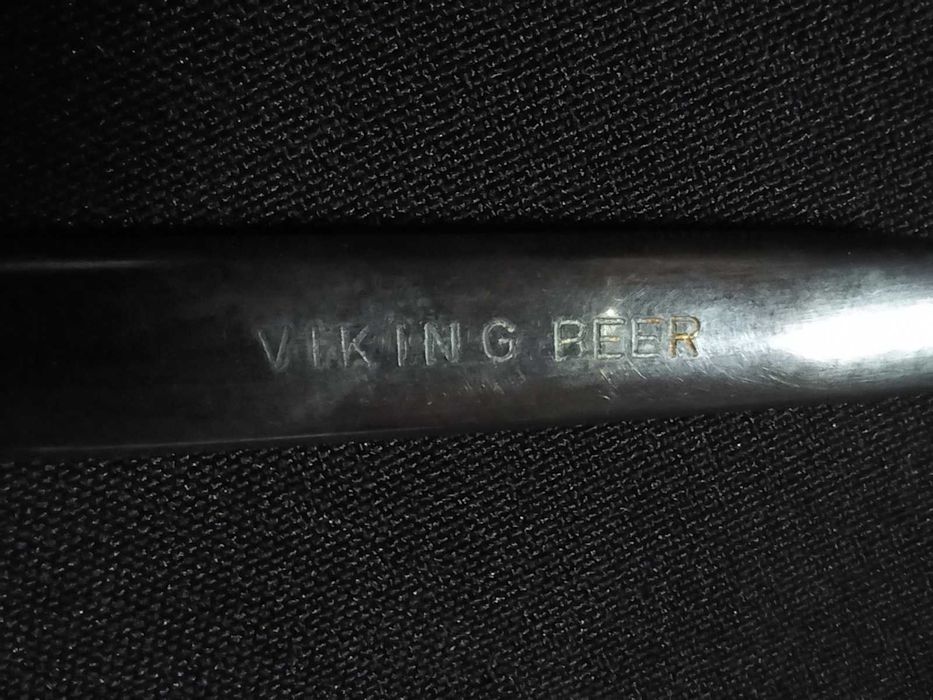 Publicidade - Tira caricas cabo em prata da Viking Beer