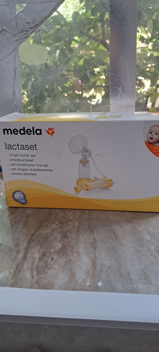 Молокоотсос Medela