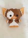 Figura grande do Gremlins Gizmo. Mede cerca de 20 cm