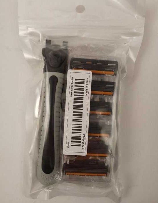 Верстат для гоління з лезами