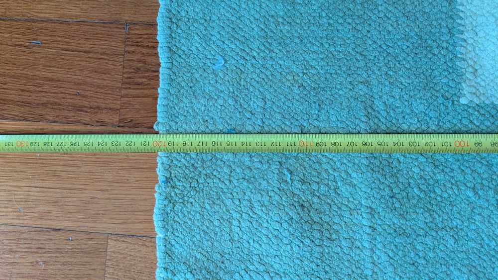 Tapete verde em bom estado