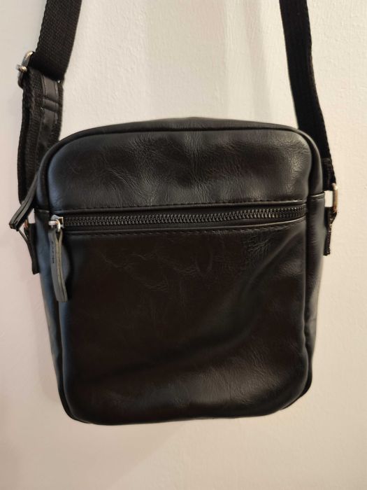 Bolsa a tiracolo de couro sintético