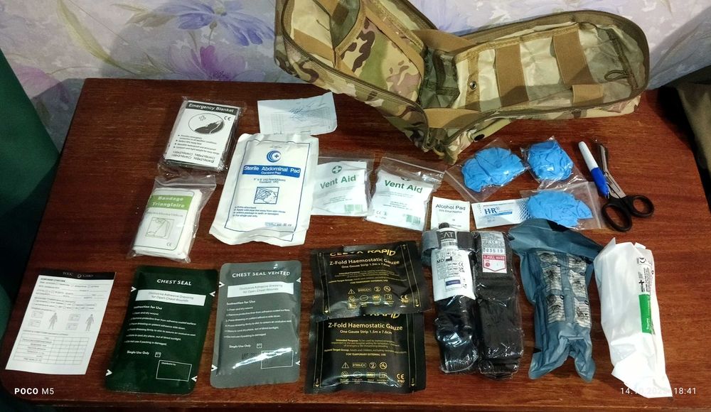 Професійна тактична аптечка IFAK з двома турнікетами CAT G7, RapidStop