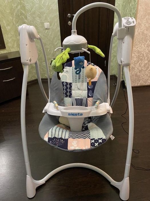 Дитячий заколисуючий центер