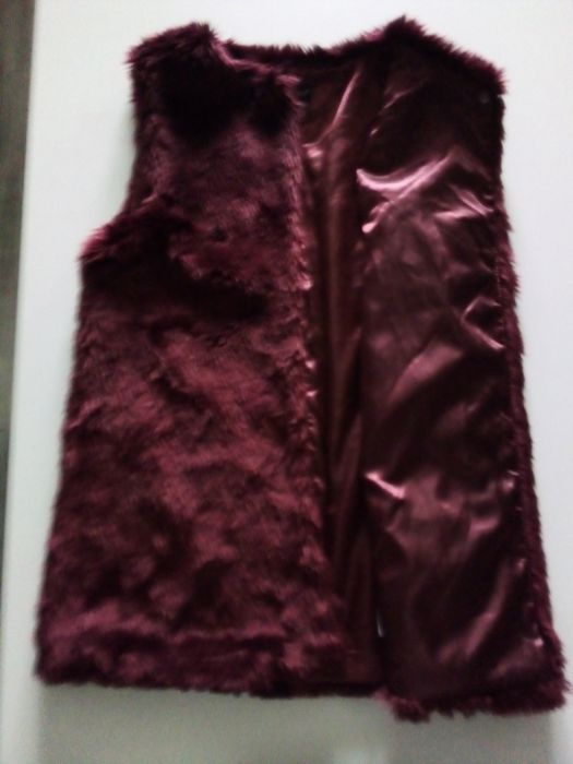 Śliczna kamizelka r. 128-134