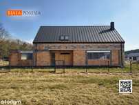 Dom  typu "stodoła'' w Prądkach Białe Błota