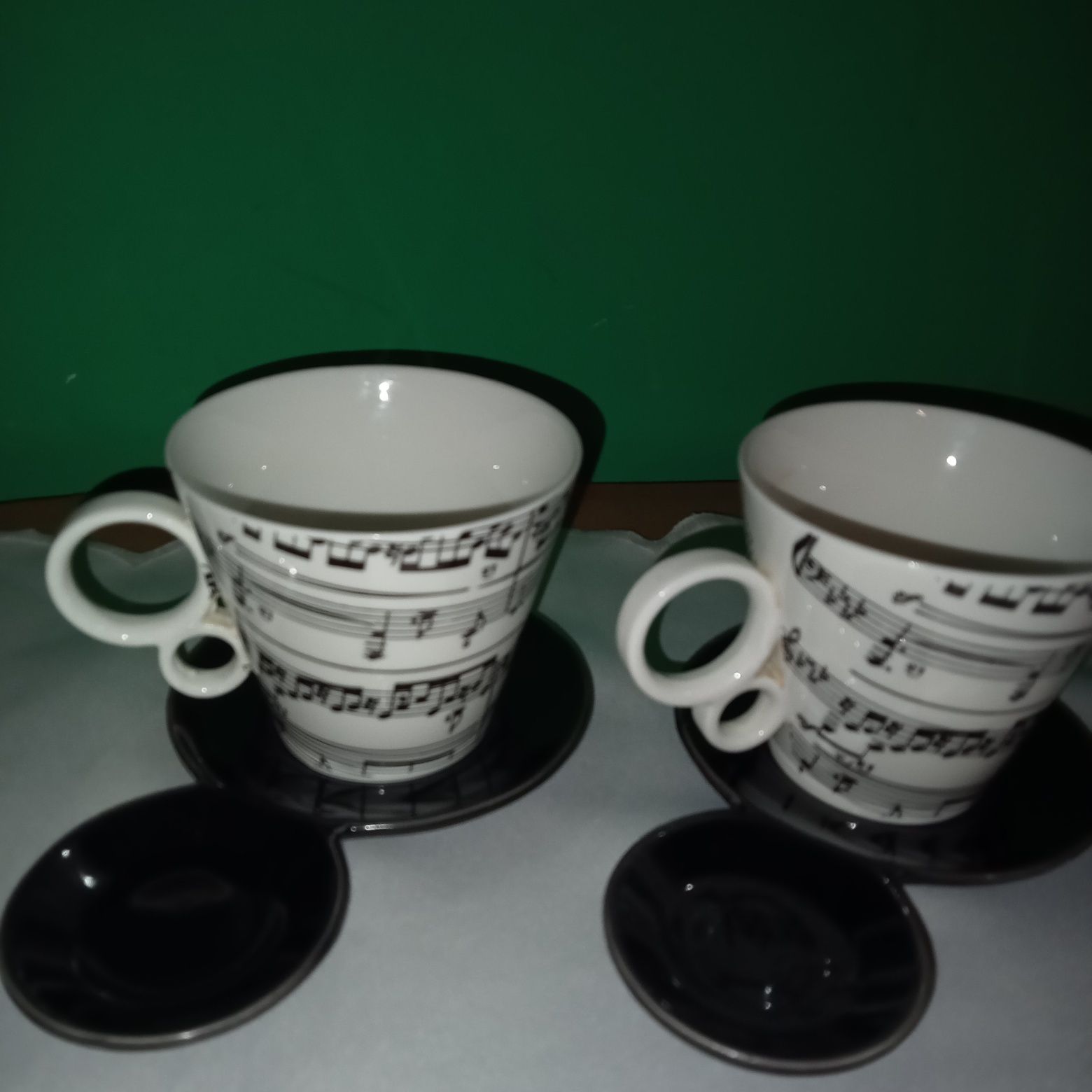 Dwa kubki do herbaty wzor nutki,z podstawkami na zużyta saszetkę herba