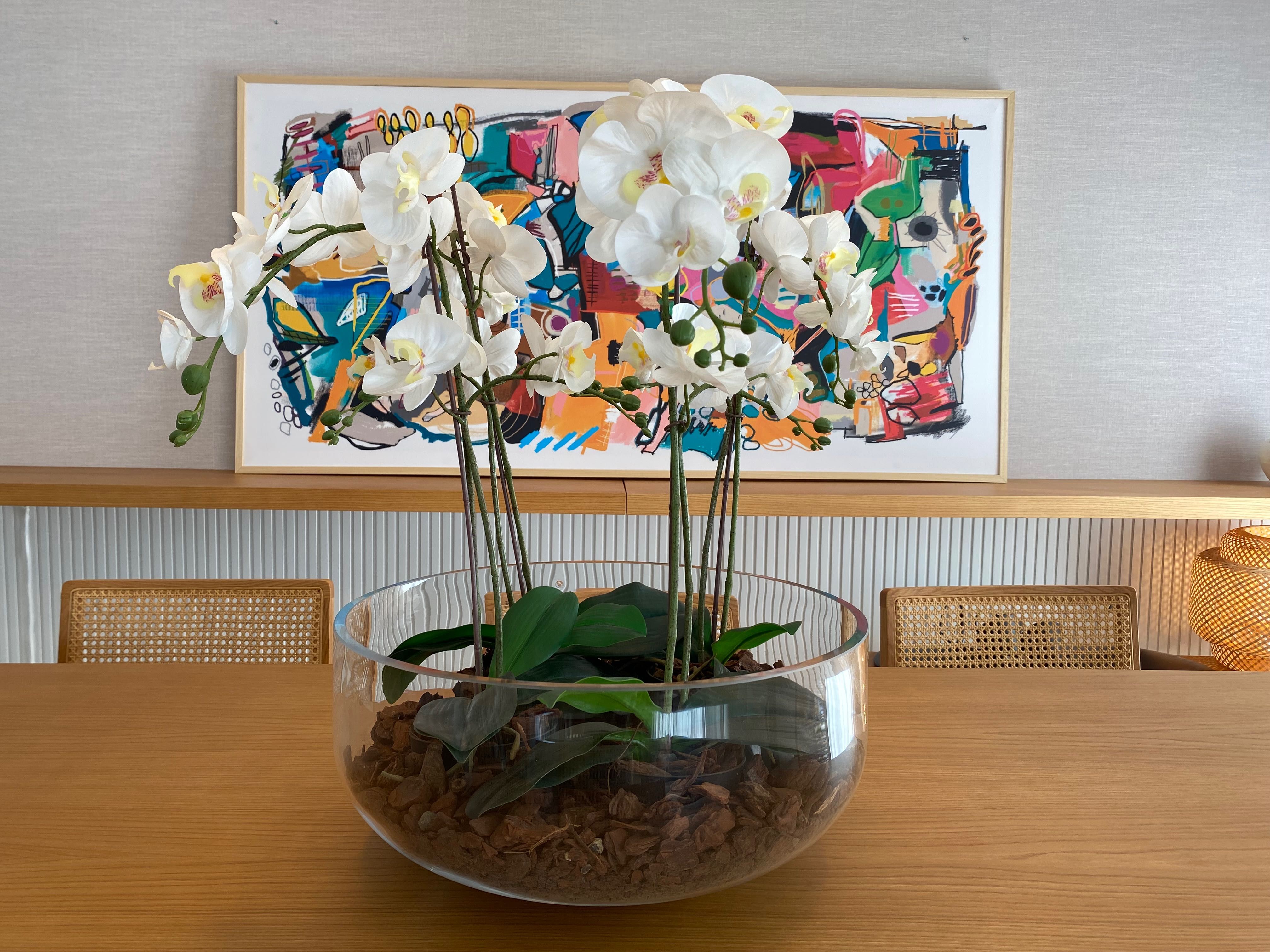 Centro de mesa com orquídeas artificiais
