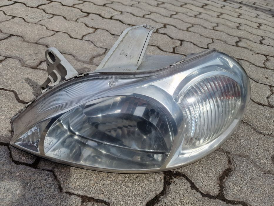 Farol esquerdo Kia Rio
