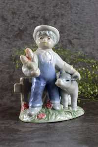 Porcelanowa figurka chłopca z krówką chłopiec porcelana vintage